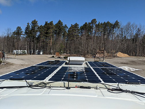 What customer say about Microgreen solar panels installed on the roof of his cabin